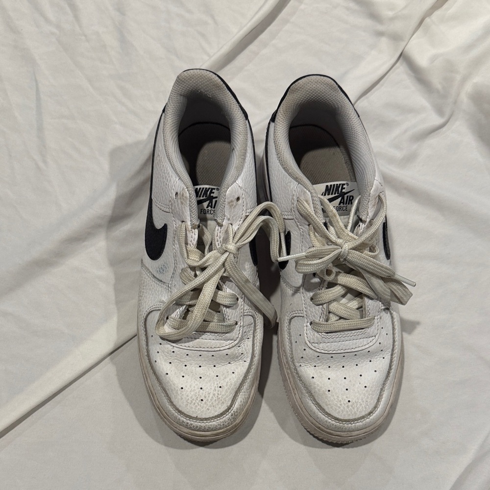 Nike Kids White Sneakers with Black Swoosh